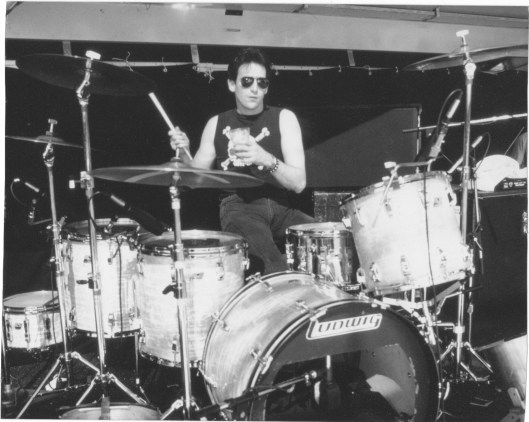 Lee on drums