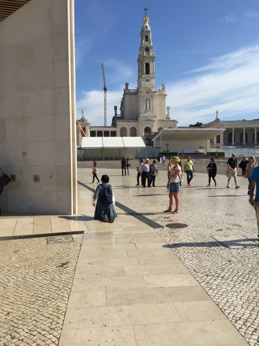 Fatima. A woman makes a pilgrimage.